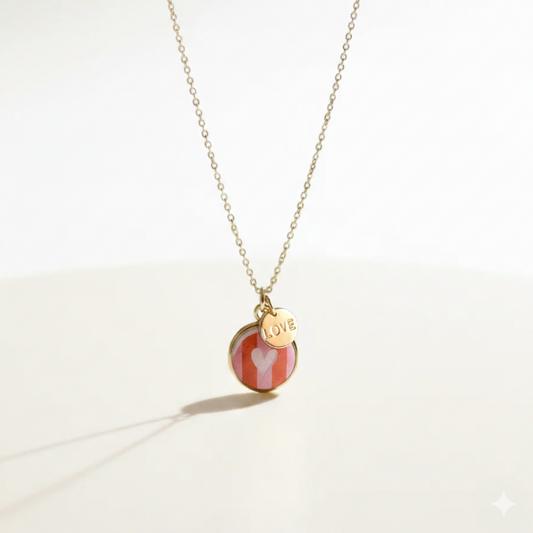 Necklace with a heart-shaped pendant on a light background